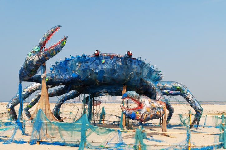 Image of a crab made out of rubbish.